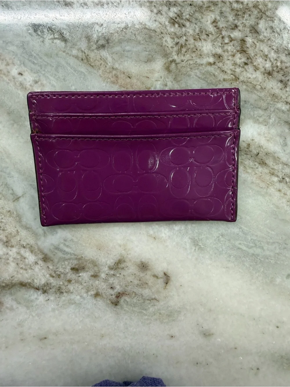 Coach sleek embossed