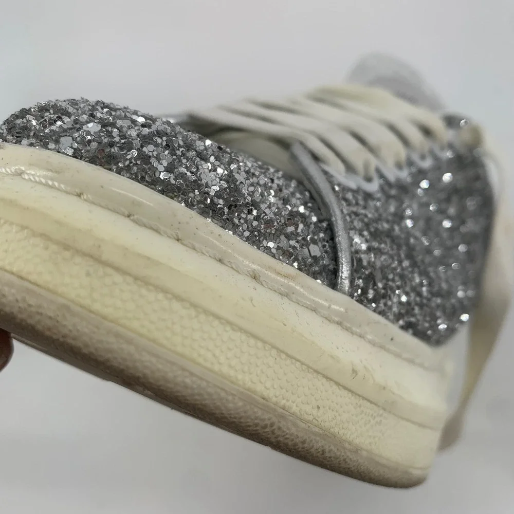 Alexander McQueen versatile closure tab