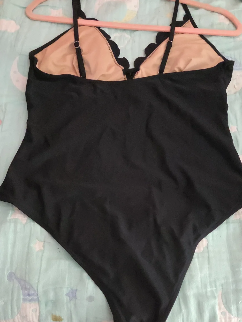 Source Unknown neckline shows figure