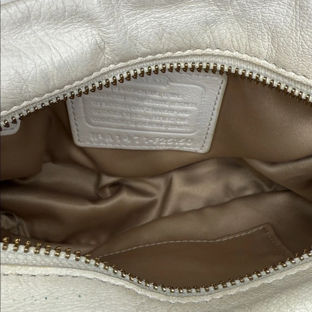 Coach chic cream