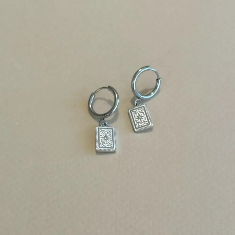 Anthropologie elegant silver