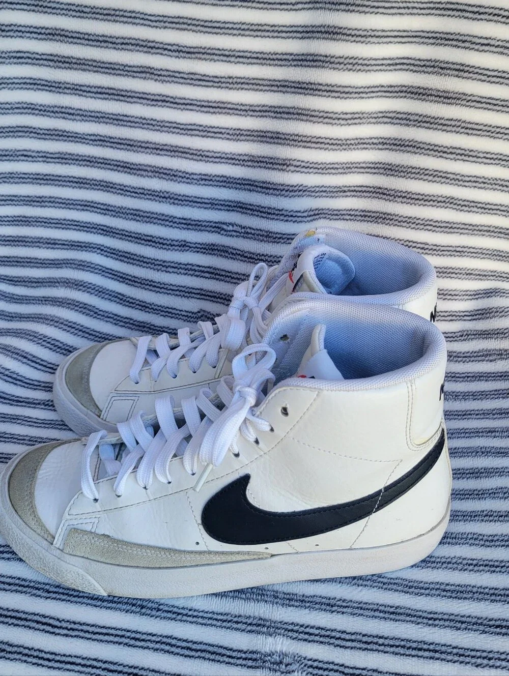 Nike White High-Top Blazers Sneakers with Black Swoosh and Red Tongue Tag