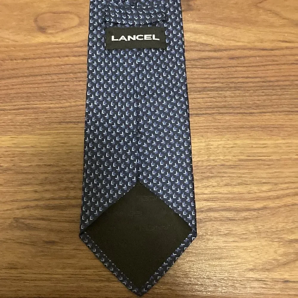 Lancel NWOT Silk Tie in Blue Signature Lancel Print. Made in Italy.