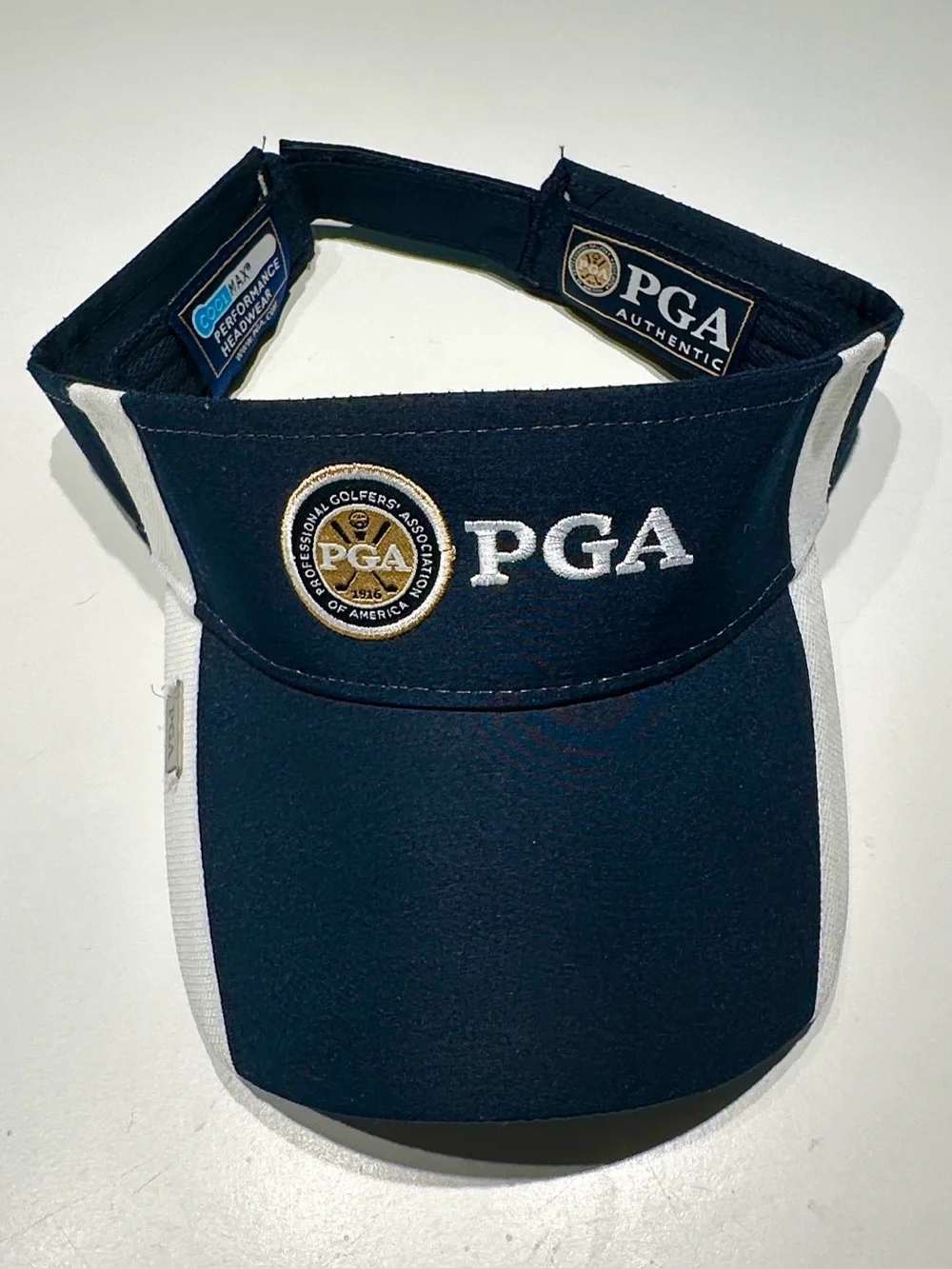 PGA Tour Navy and White Visor with Gold Logo