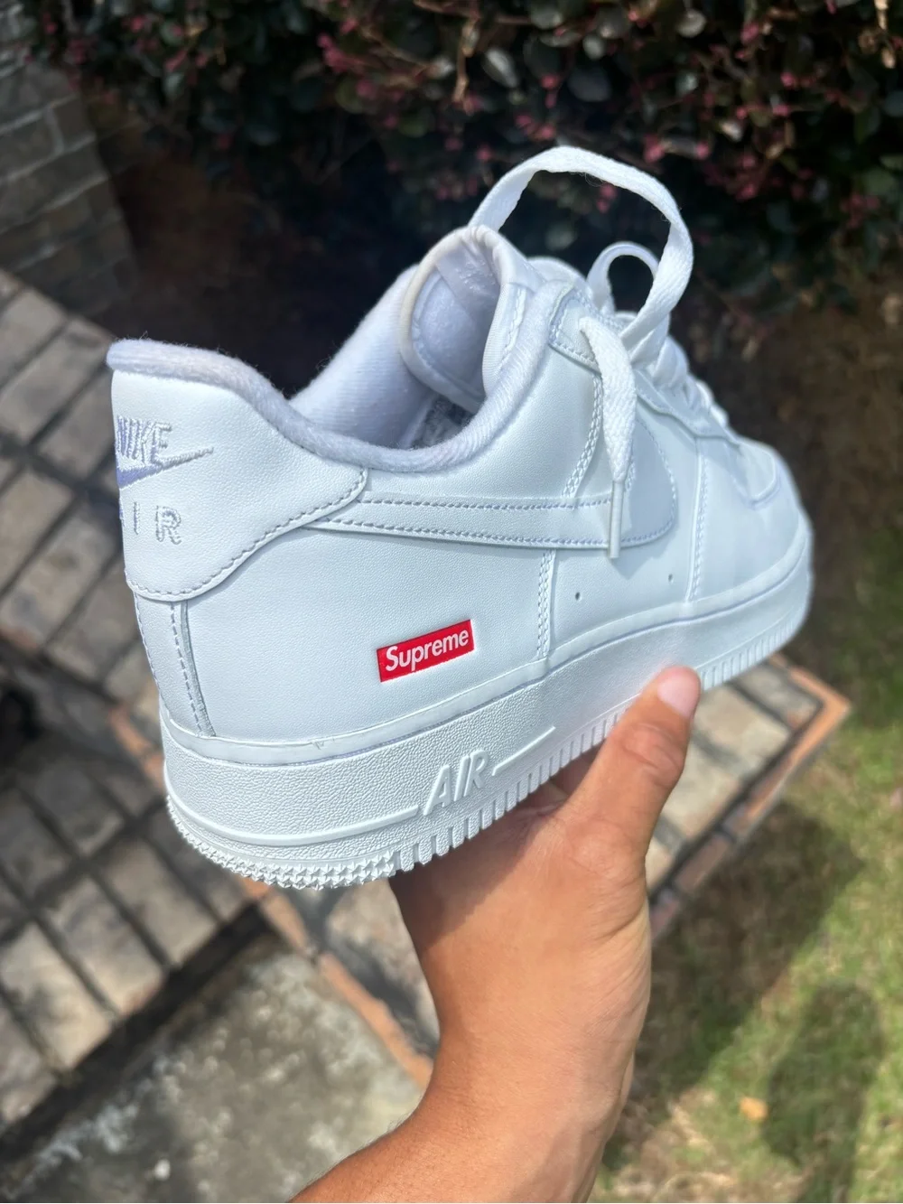 Nike White Low-Top Leather Sneaker with Red Supreme Box Logo