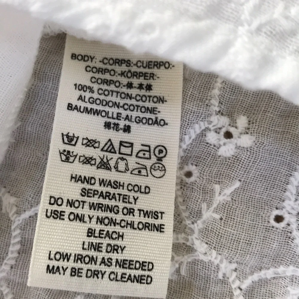 NWT! FREE PEOPLE Size XS white eyelet oversized top