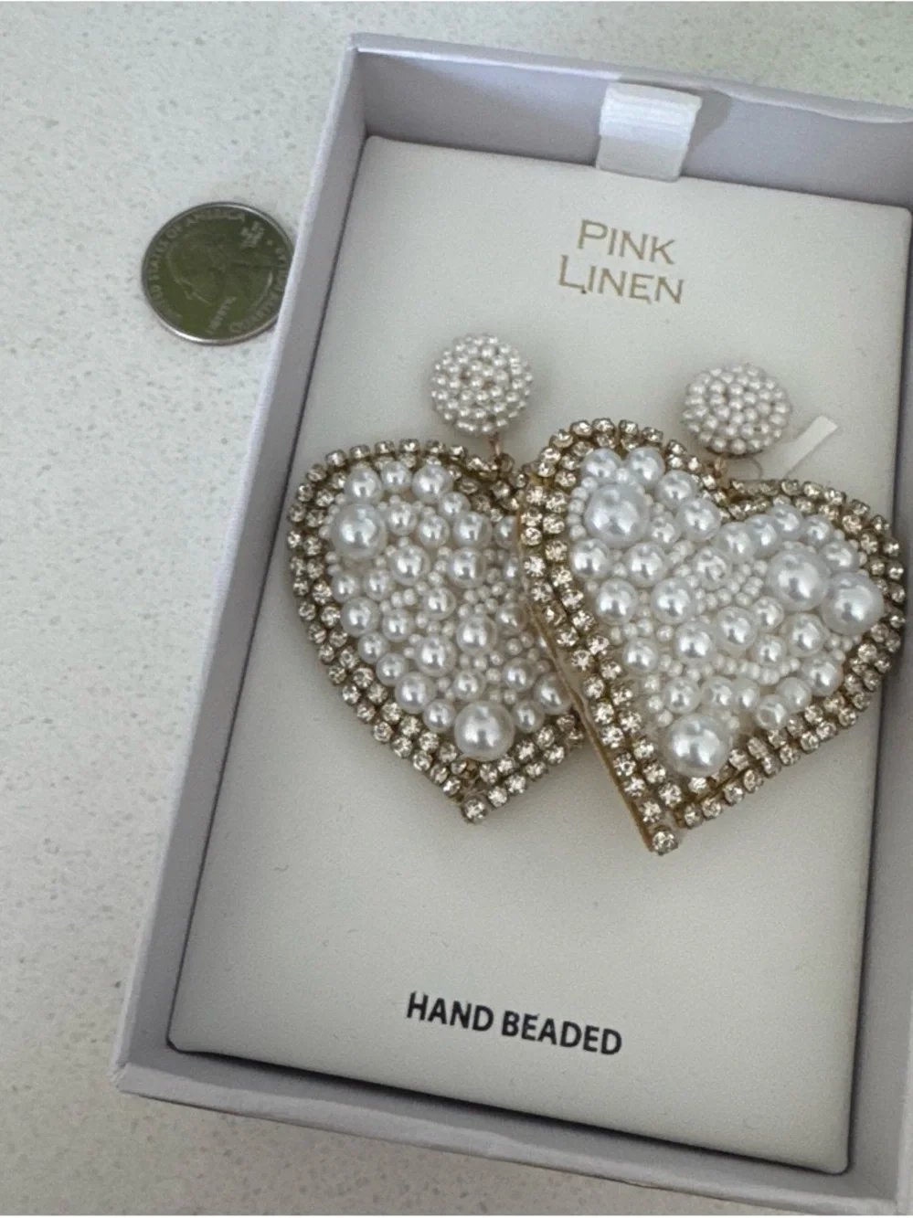 None hand beaded