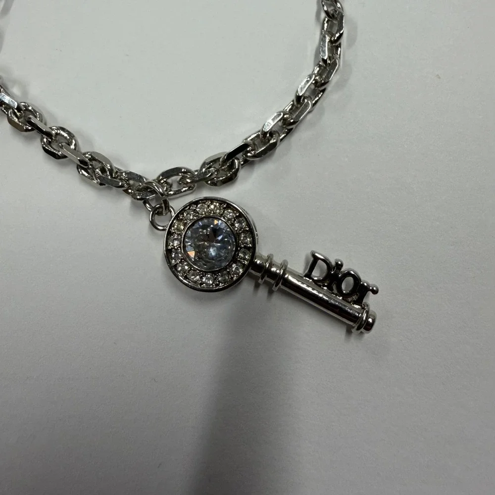 Christian Dior Silver Tone Key Charm Bracelet Crystal Logo Jewelry