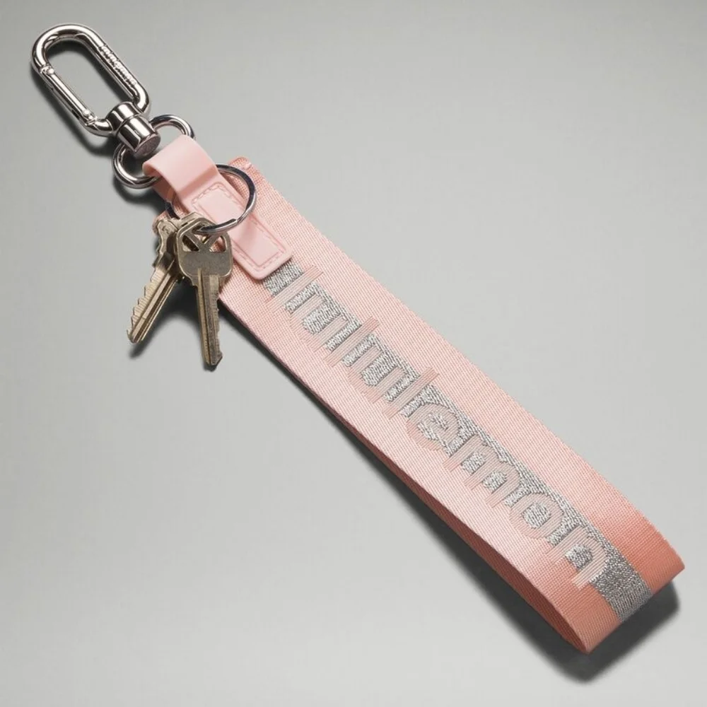 Lululemon Never Lost Pink Mist, silver logo keychain lanyard