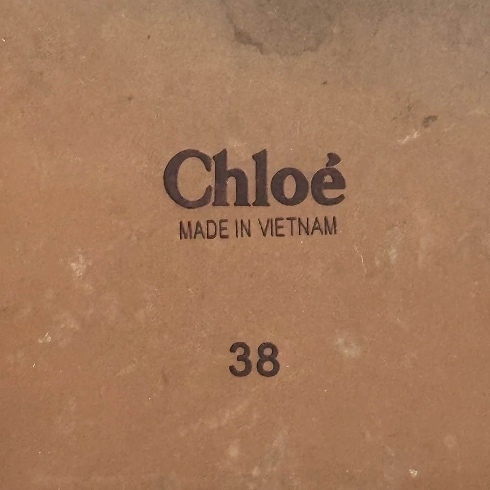 Chloe very gently