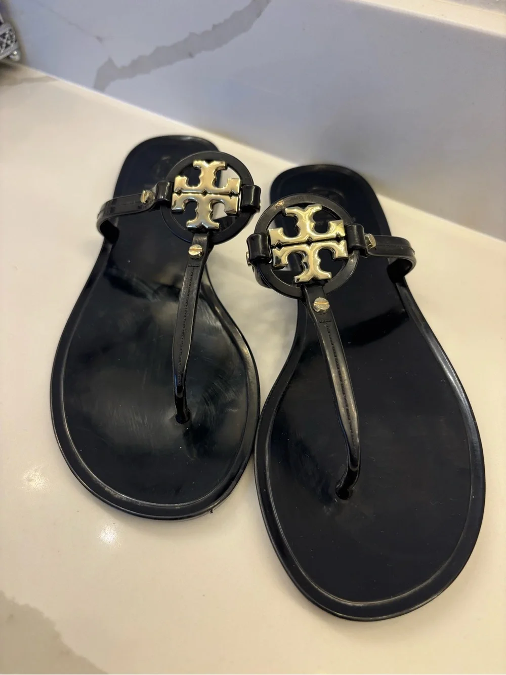 Tory Burch Black Jelly Thong Sandals with Gold Logo