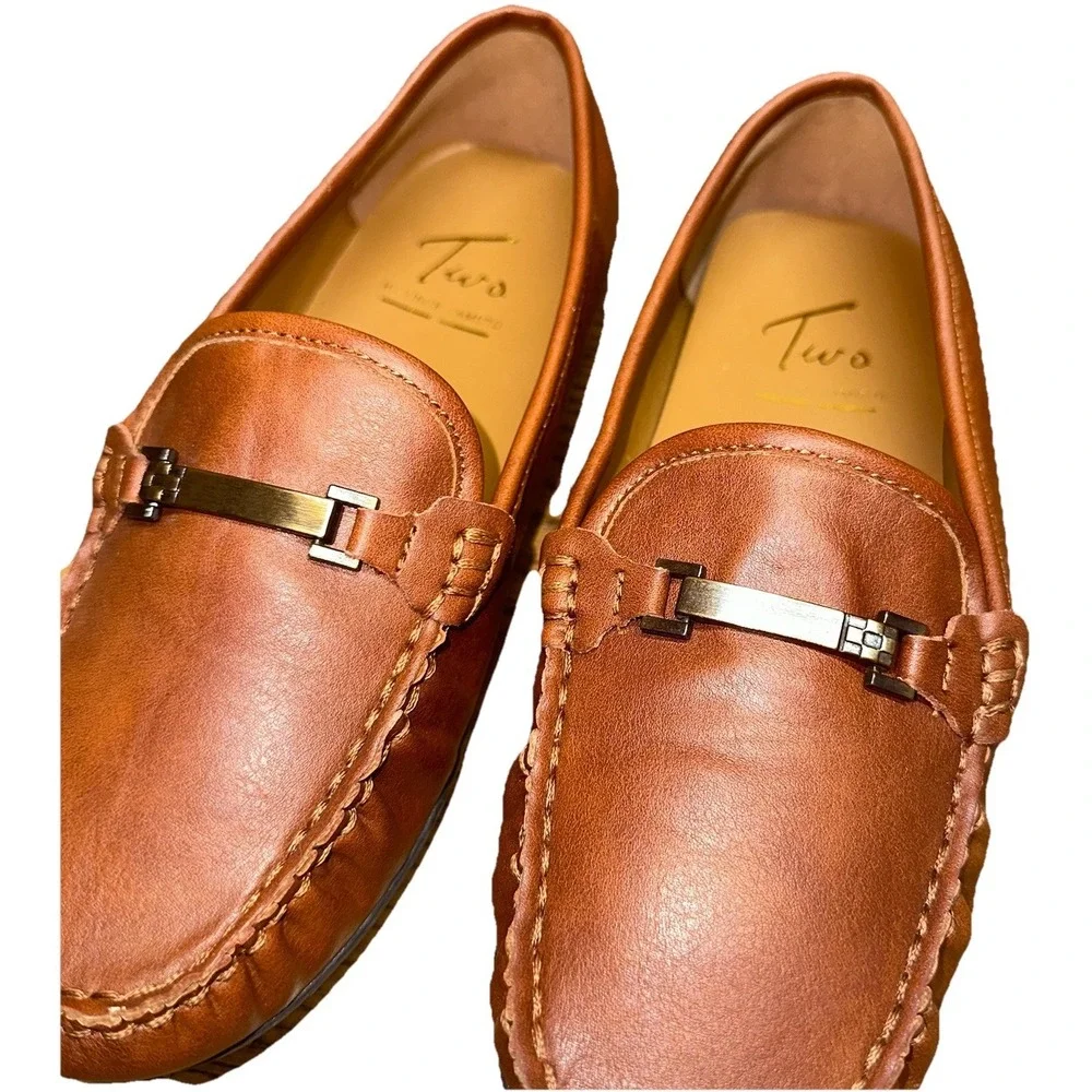 Vince Camuto please see