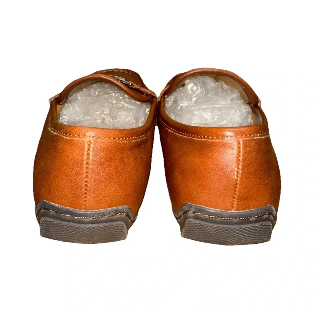 Vince Camuto please see