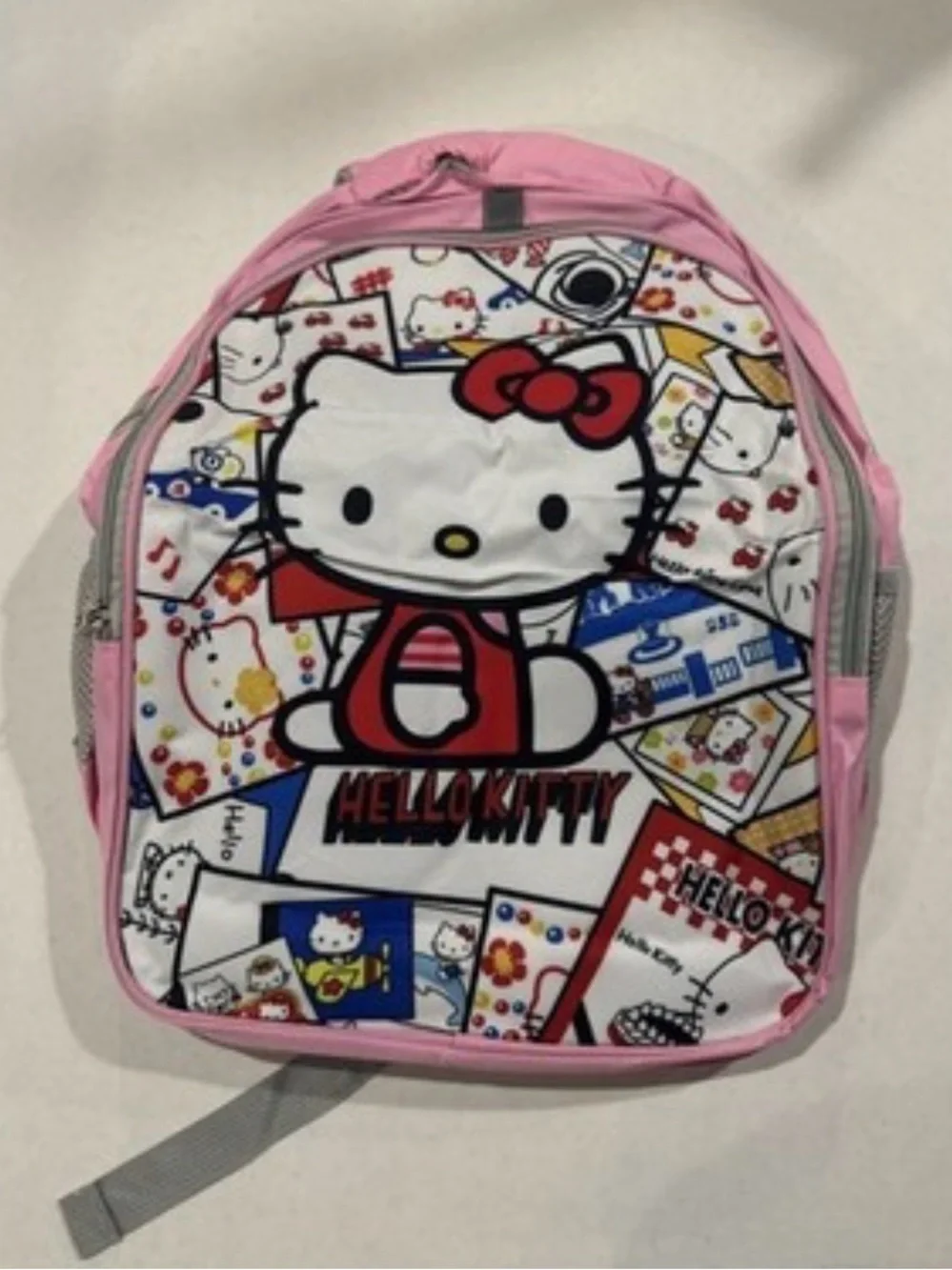 NEDISP Hello Kitty White Comic Collage Kids BOOKSACK with Pink/Gray Trim