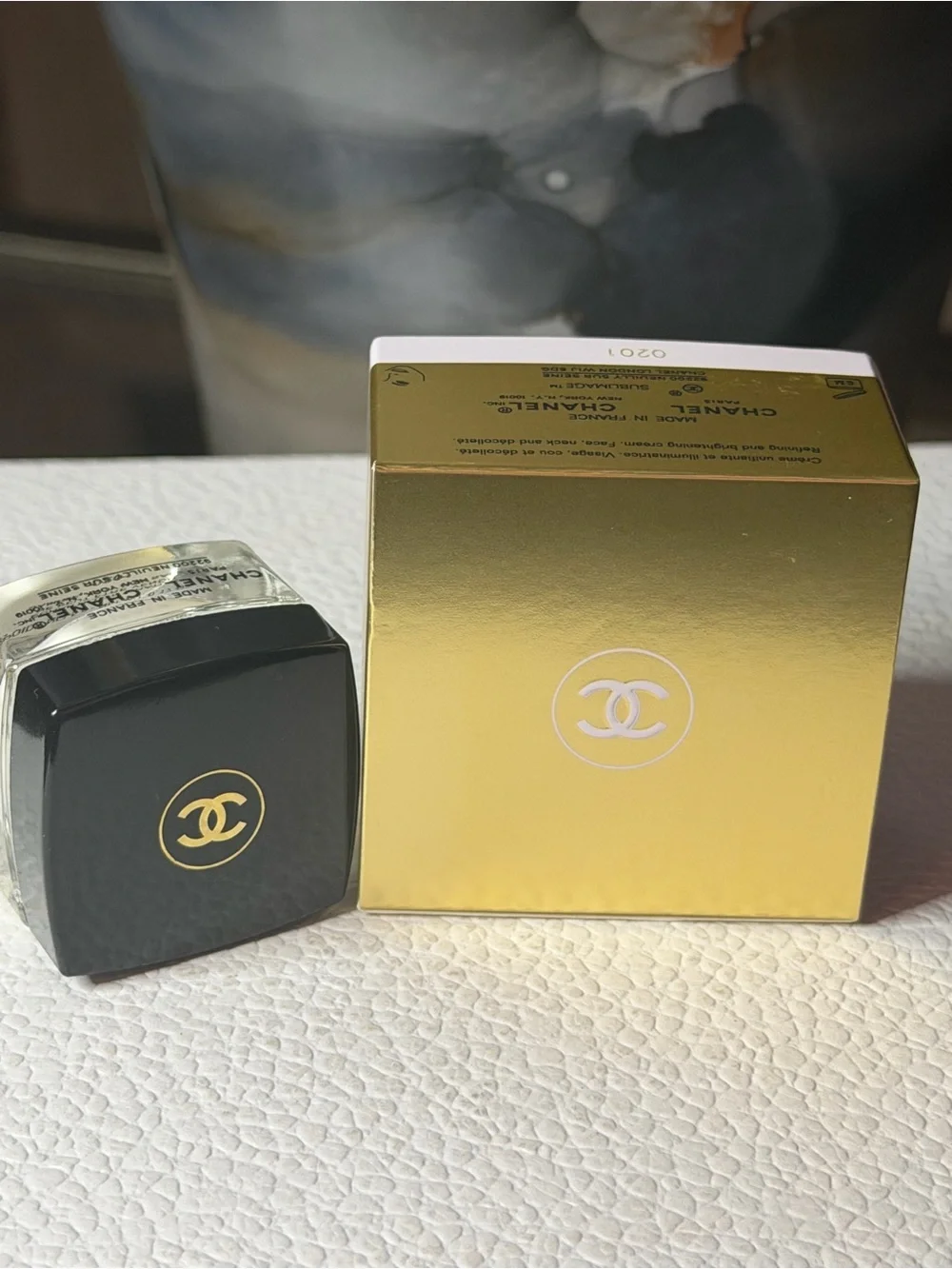 CHANEL face gold black
