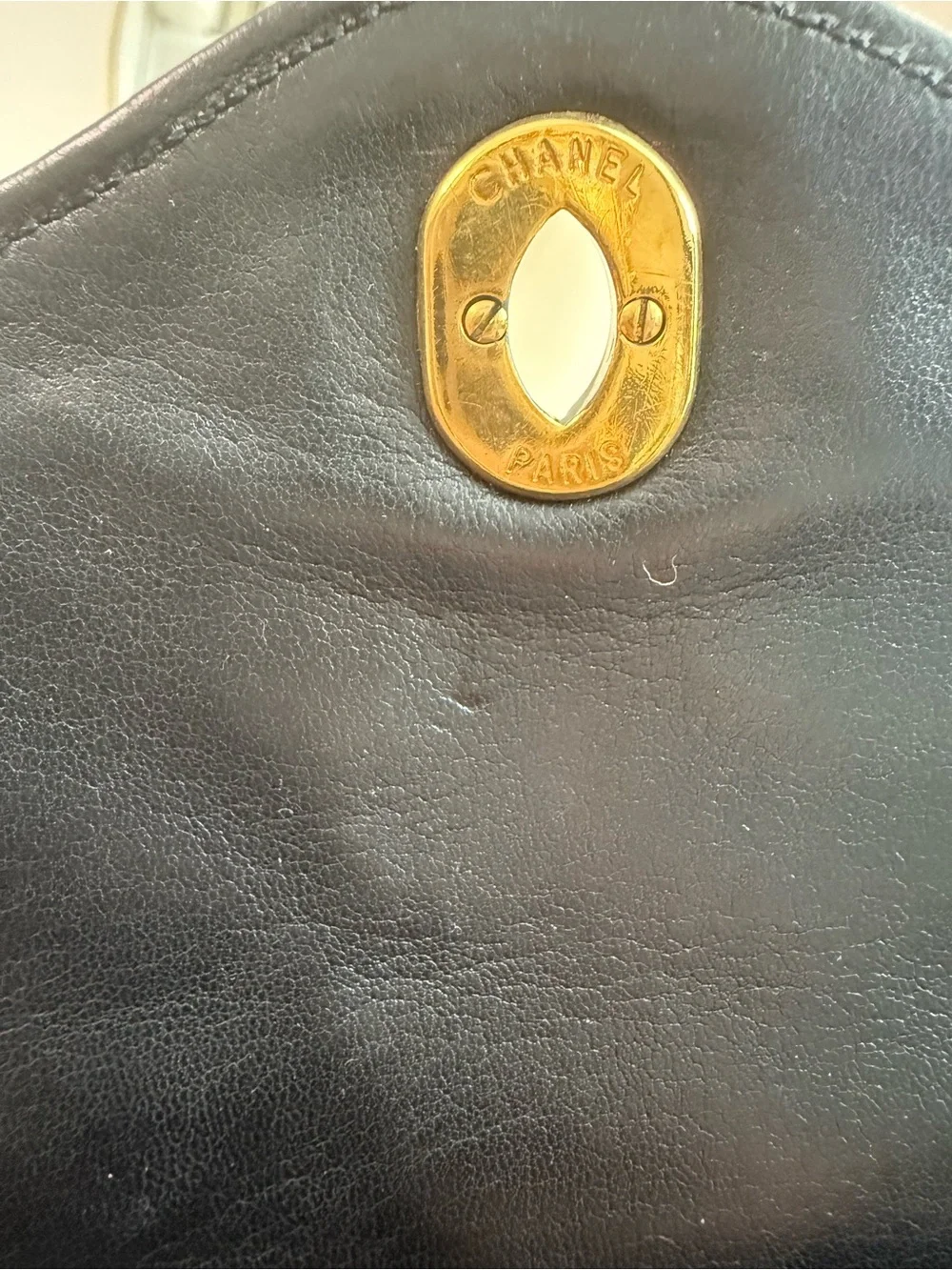 CHANEL Black Quilted Leather Shoulder Bag with Gold Chain Strap