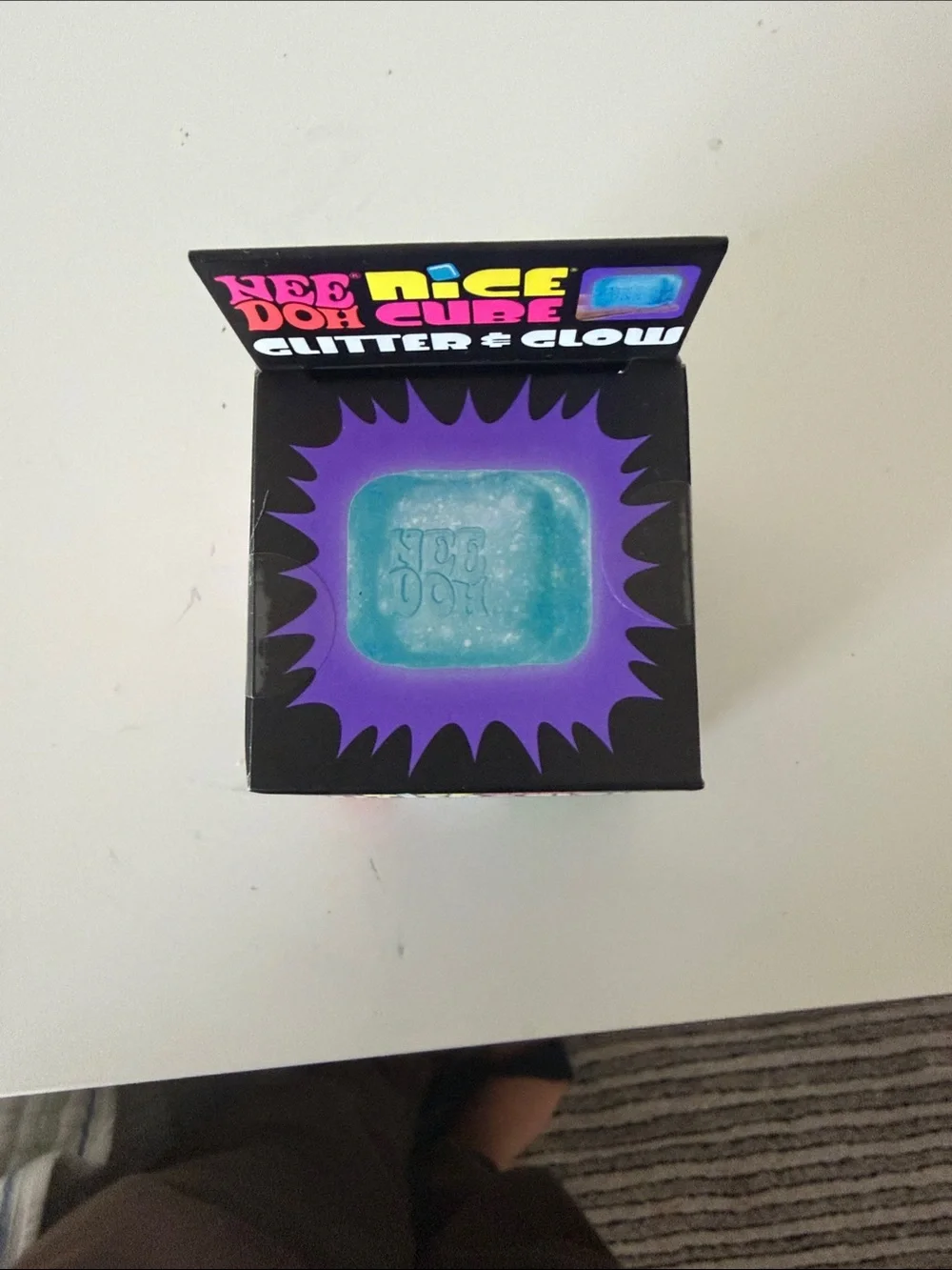 NEW unopened NeeDoh Nice Cube Glitter & Glow. Color purple.