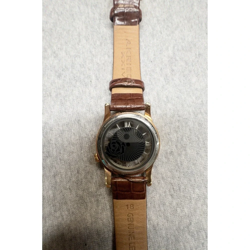 Akribos XXIV 34mm transparent crystal