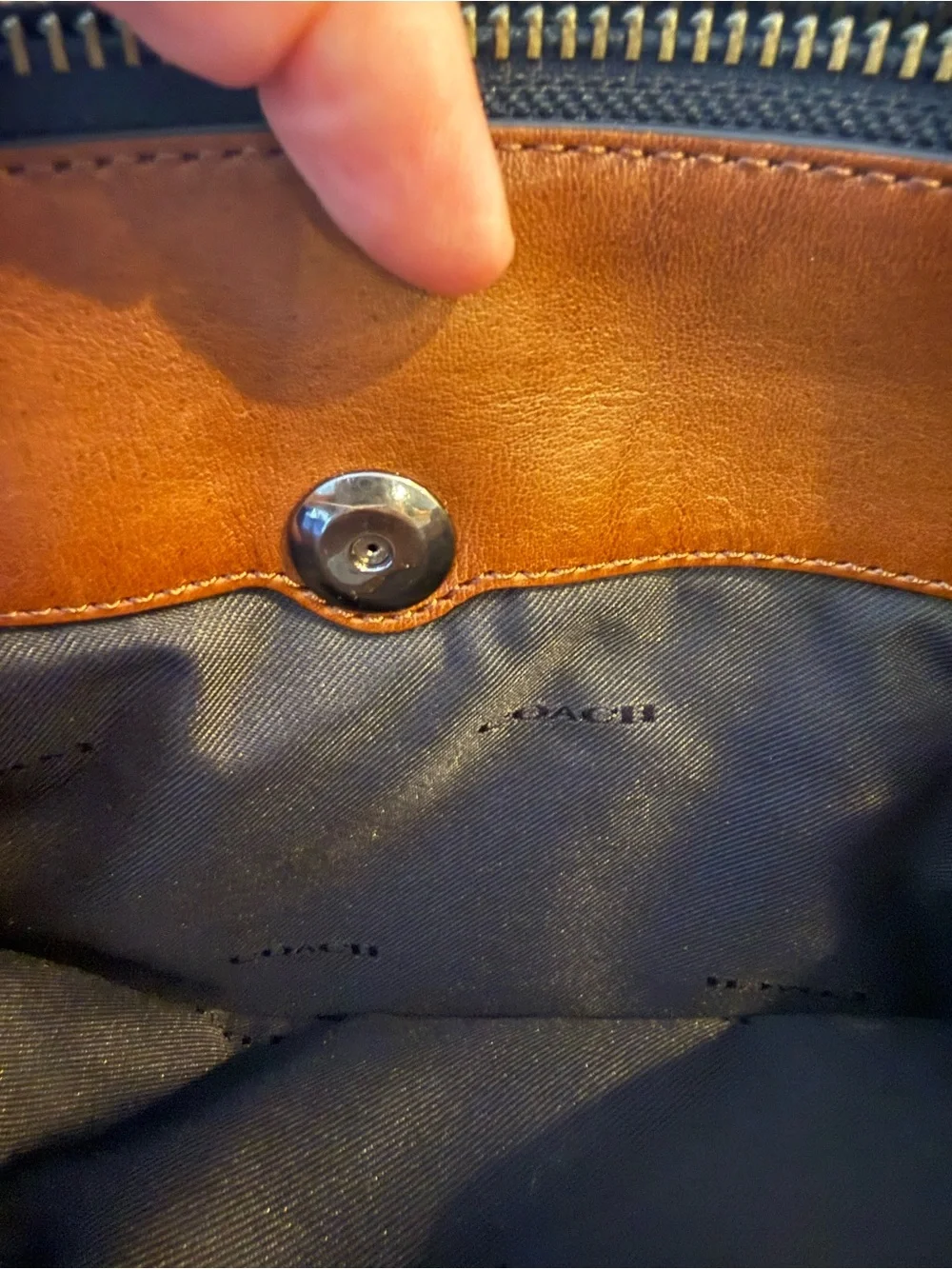 Coach sleek leather