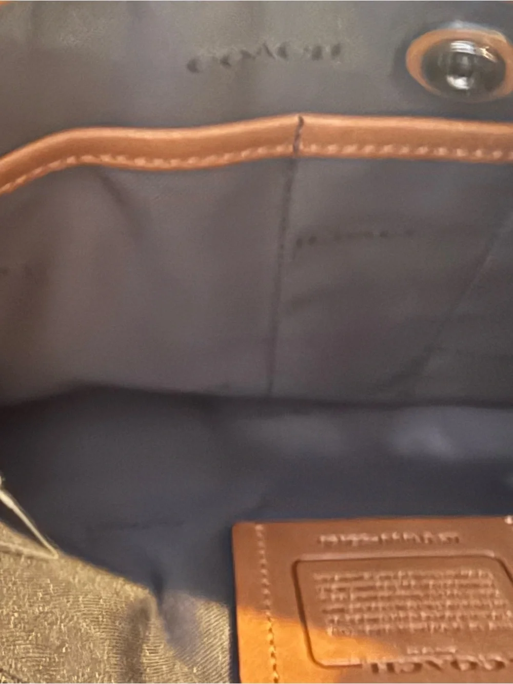 Coach sleek leather