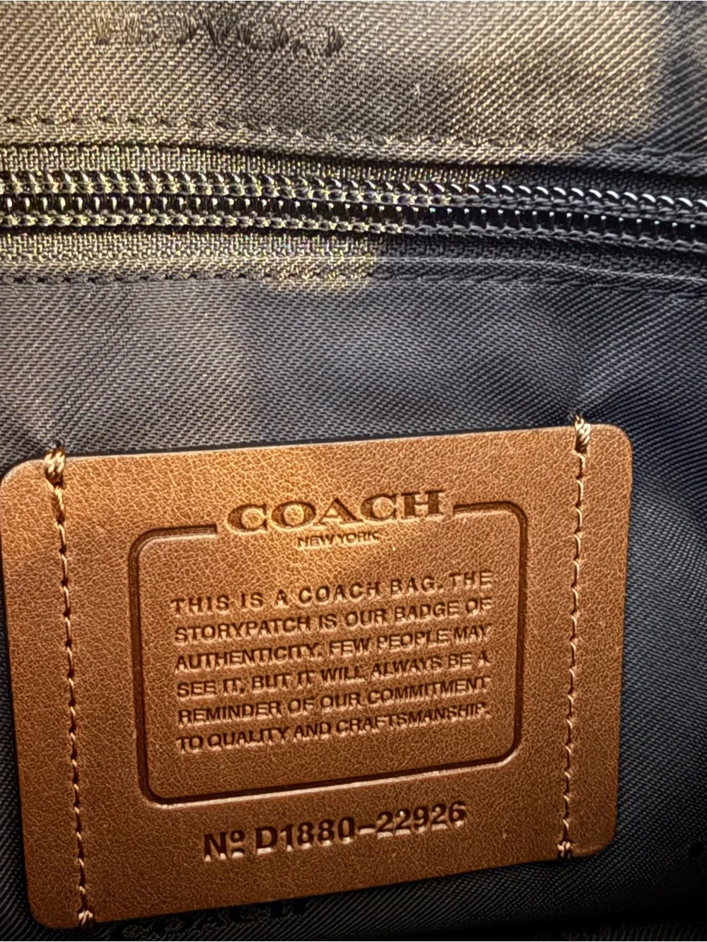 Coach sleek leather