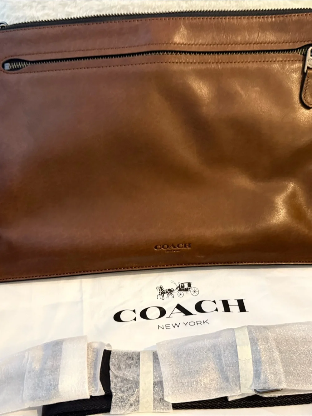 Coach sleek leather