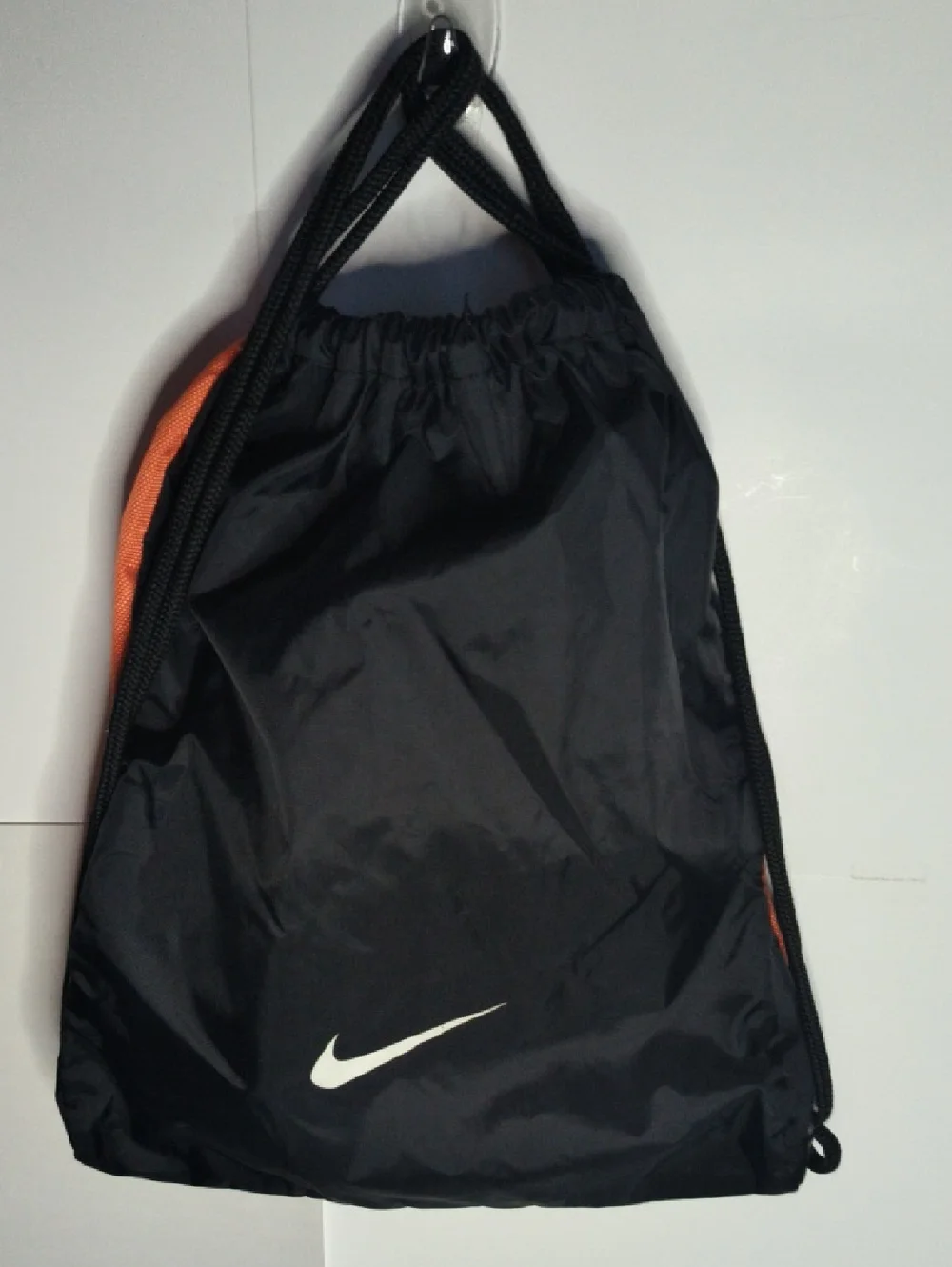 Nike Orange And Black Reversible Drawstring Backpack with White Swoosh
