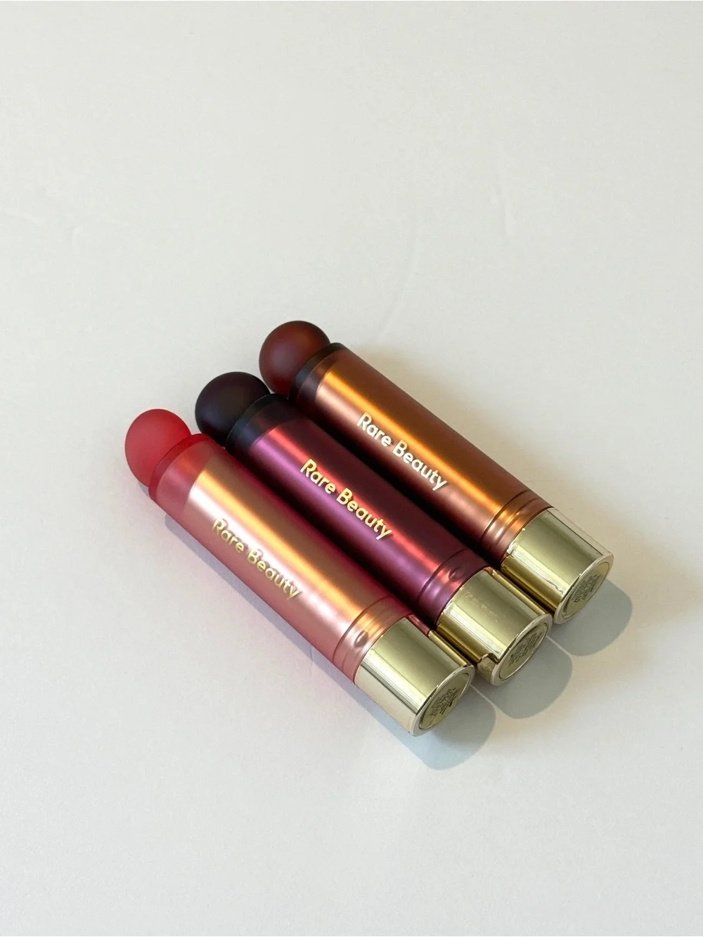 New rare beauty lip oil sticks