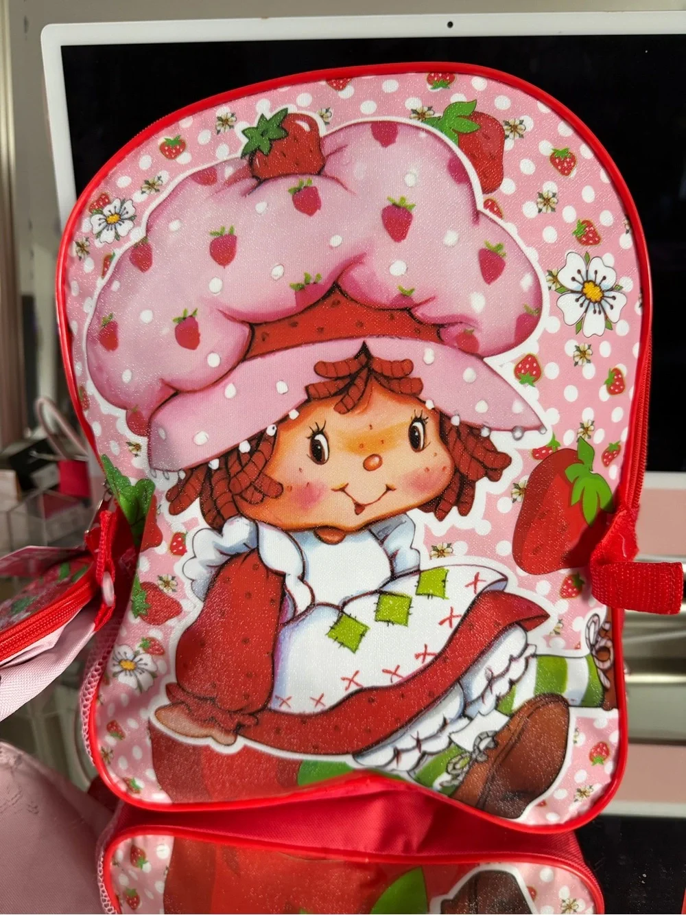 Pink Strawberry Kids Backpack with Lunchbox and a strawberry wireless speaker