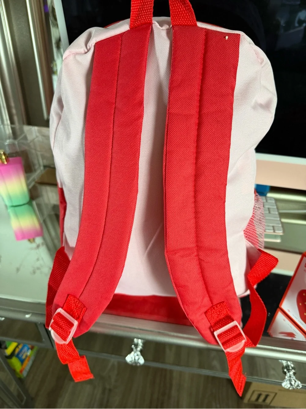 Pink Strawberry Kids Backpack with Lunchbox and a strawberry wireless speaker