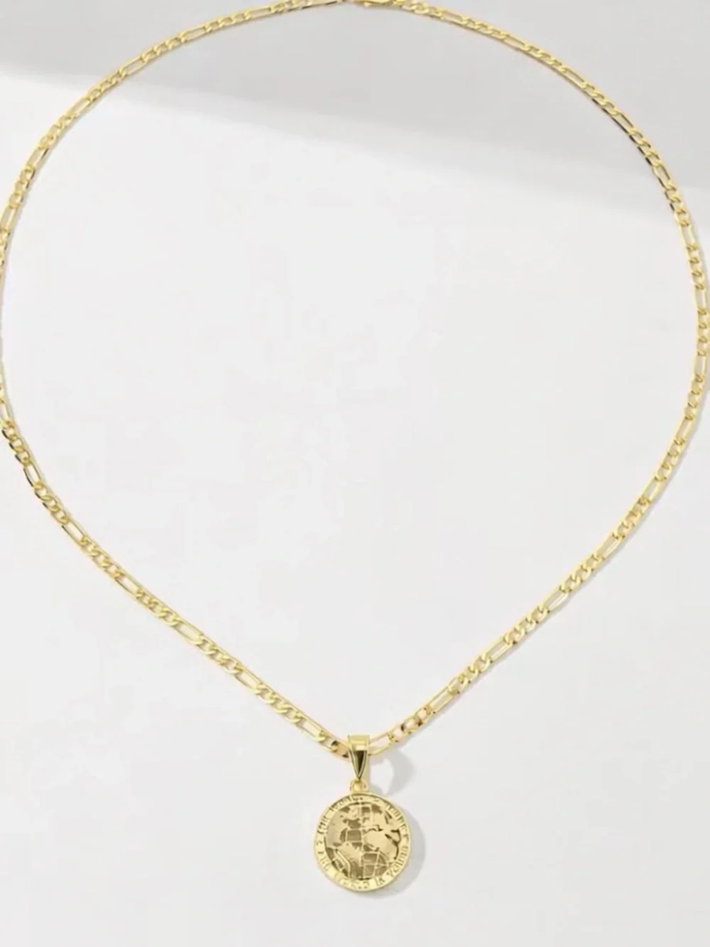 The World Is Yours chain necklace with pendant