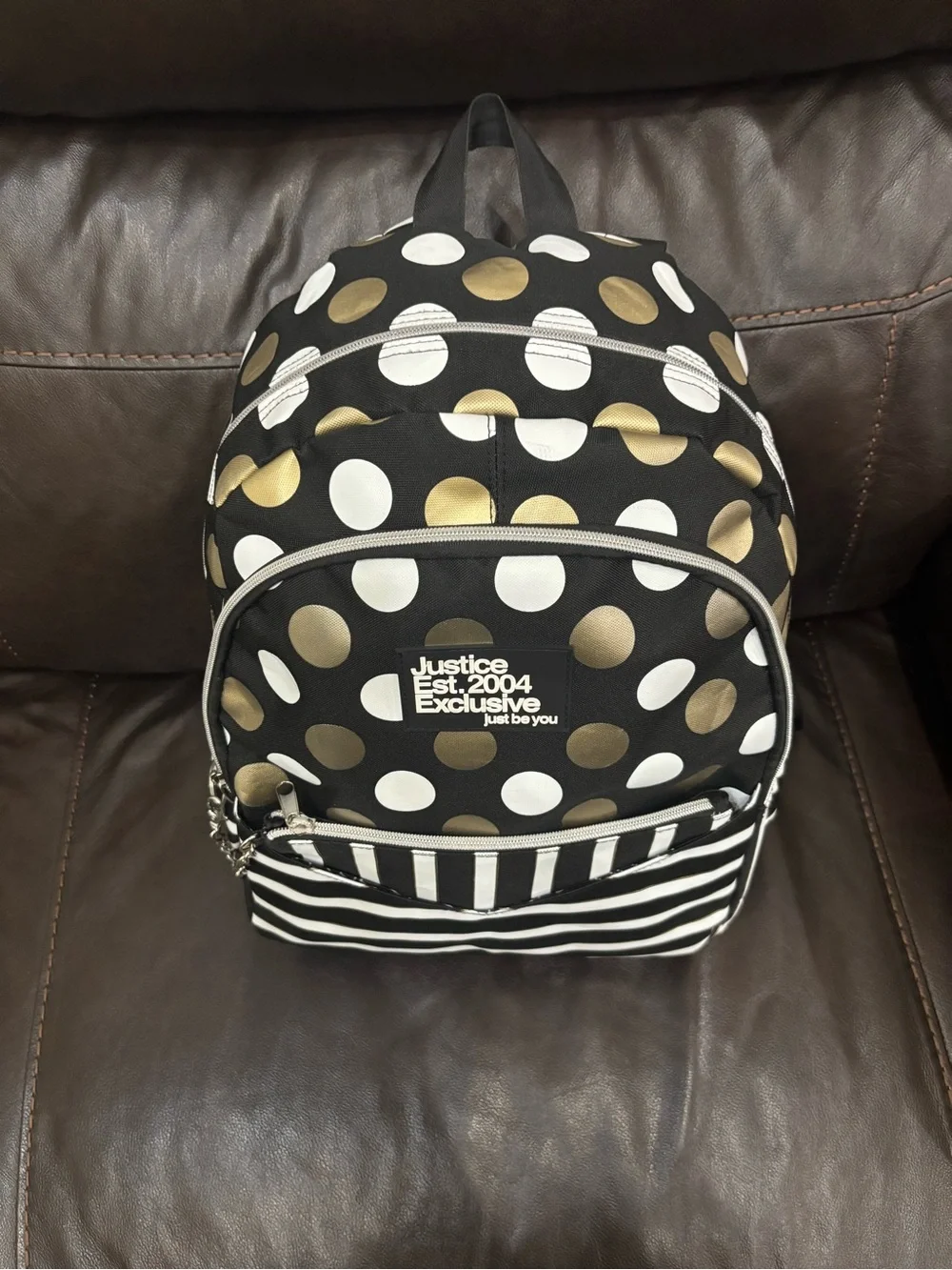 Justice Black Backpack with White and Gold Polka Dots & Stripes