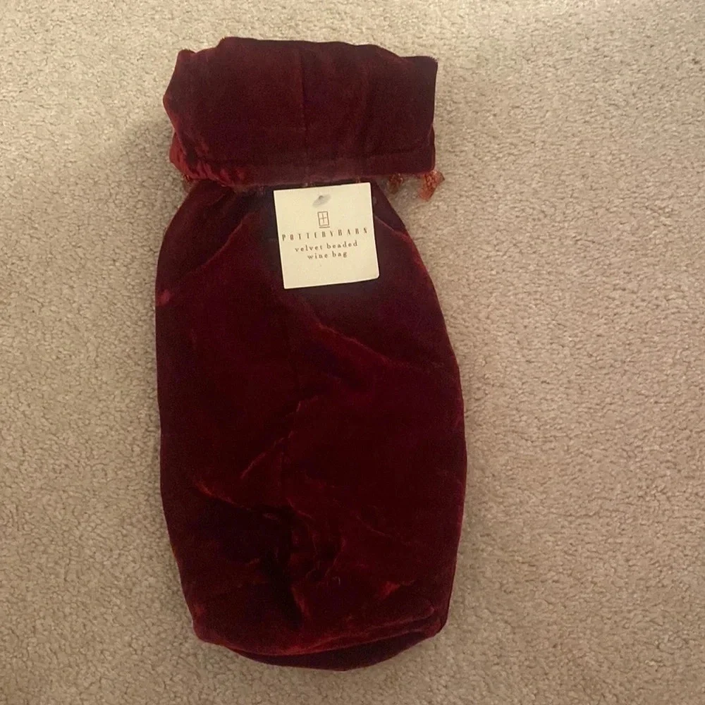 Pottery barn red velvet beaded wine bag