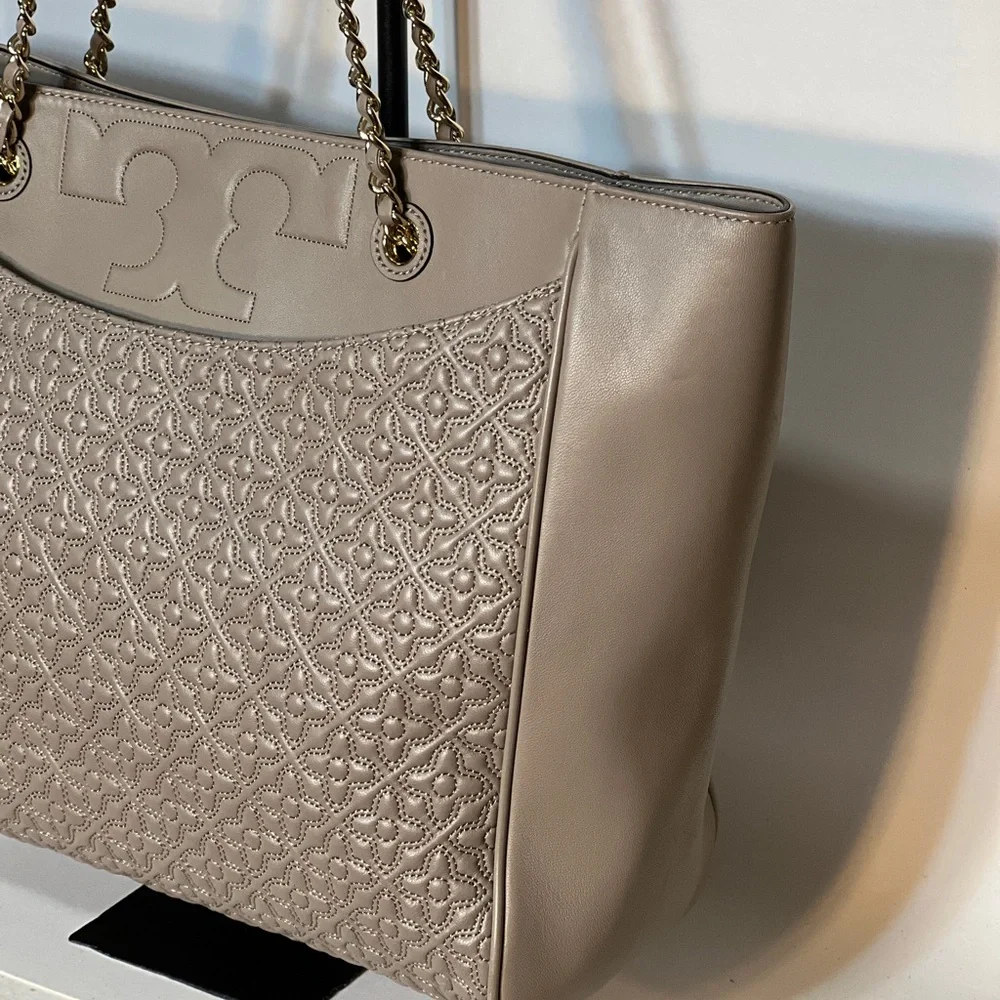 Tory Burch own are please