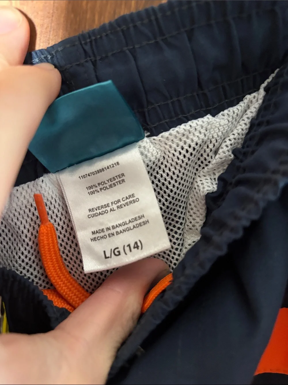 NWT Liquid Wave Men's Two-Tone Orange and Navy Swim Trunks