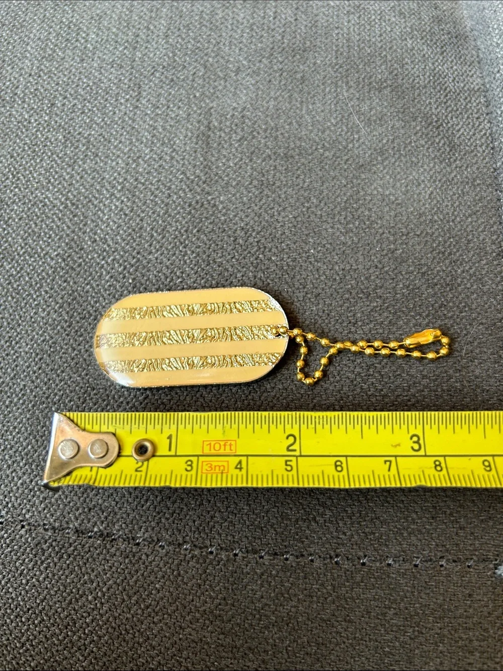 CHANEL dog tag