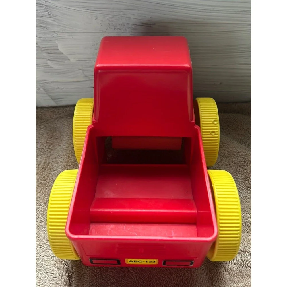Tupperware toy red