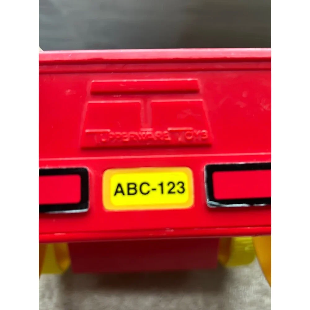 Tupperware toy red