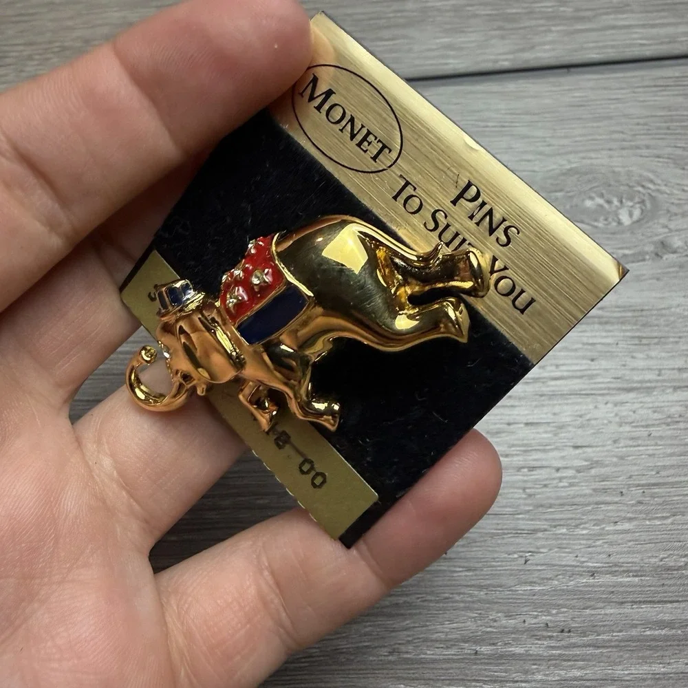 Vintage Monet Patriotic Elephant Brooch Pin Gold Tone Red White Blue Enamel NOS