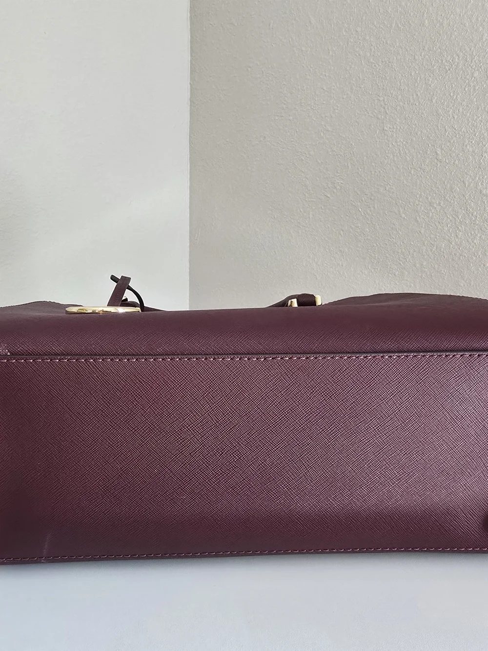 Michael Kors plum use includes