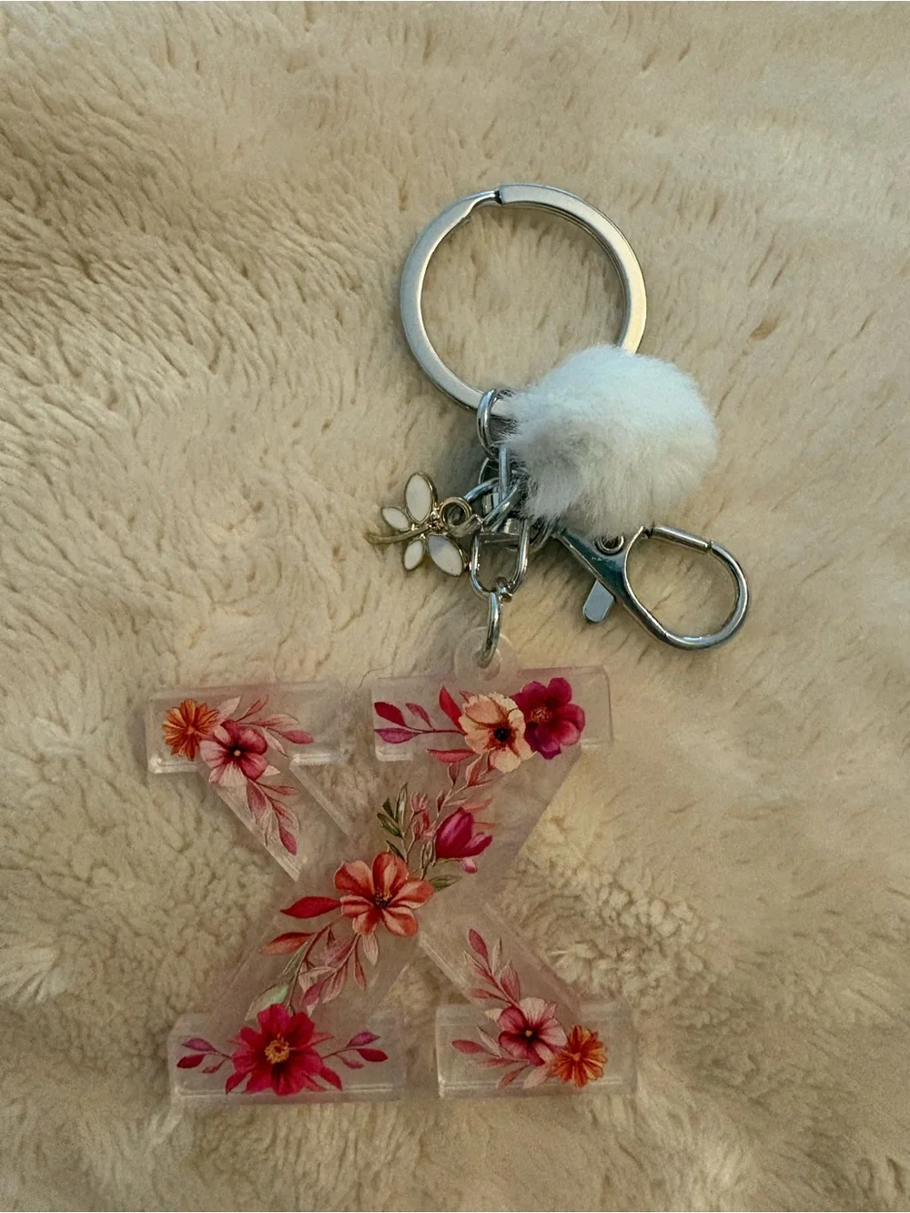 Floral Resin 'X' Keychain with White Pom Pom