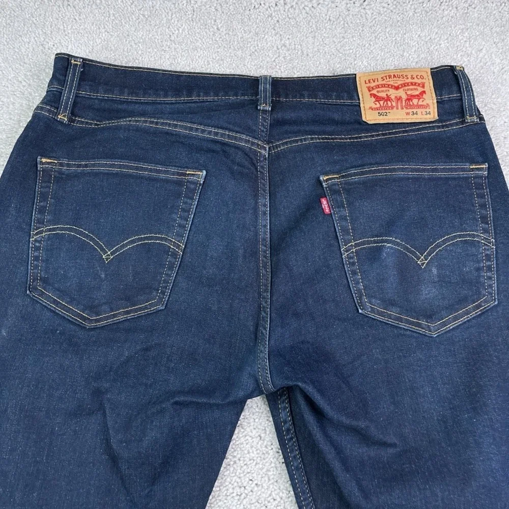 Levis Jeans Mens 34x34 Blue 502 Tapered Fit Dark Wash Stretch Denim Casual‎