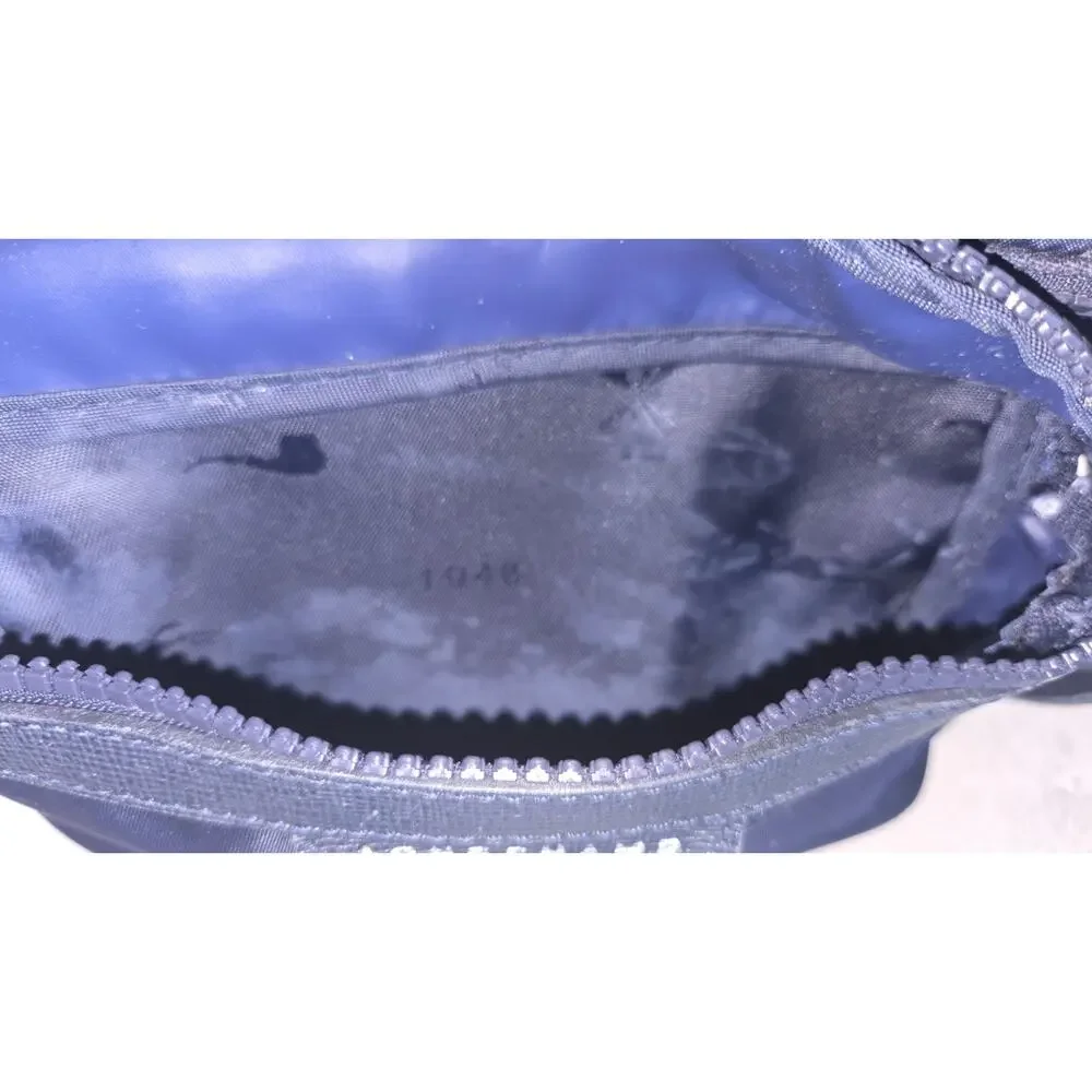 Longchamp top belt kept
