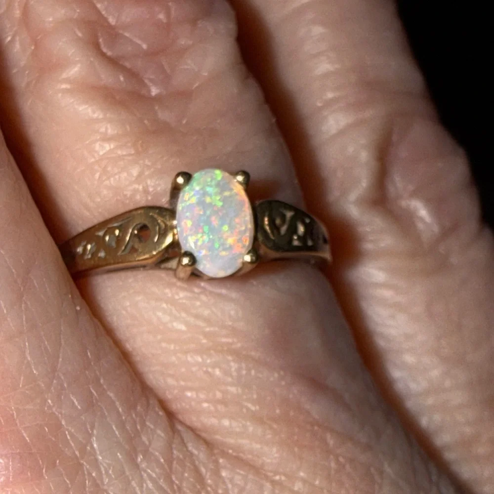 Gold Opal Solitaire Ring in Iridescent White