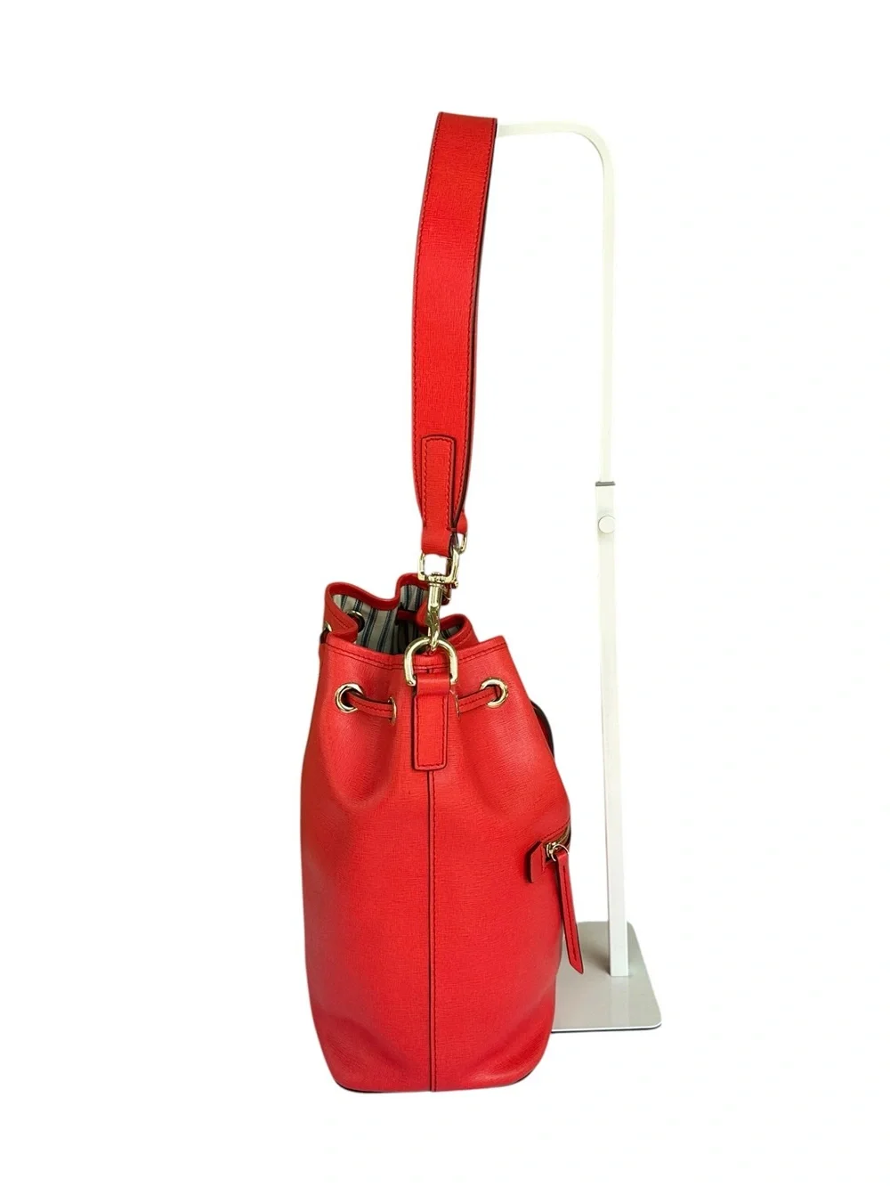 Dooney & Bourke Red/Coral Saffiano Leather Drawstring Bucket Shoulder Bag.