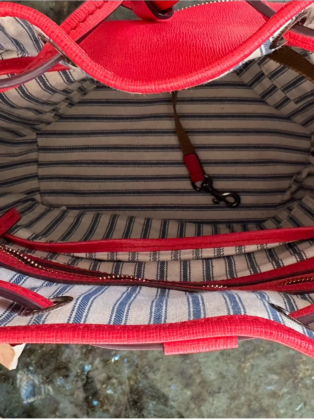 Dooney & Bourke Red/Coral Saffiano Leather Drawstring Bucket Shoulder Bag.