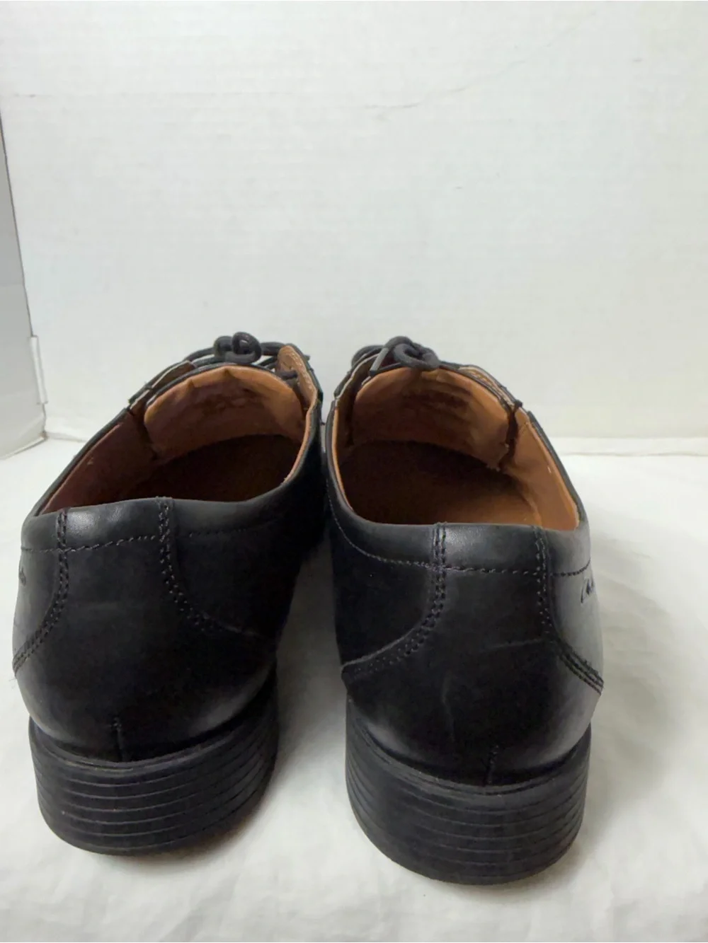 Clarks polished black