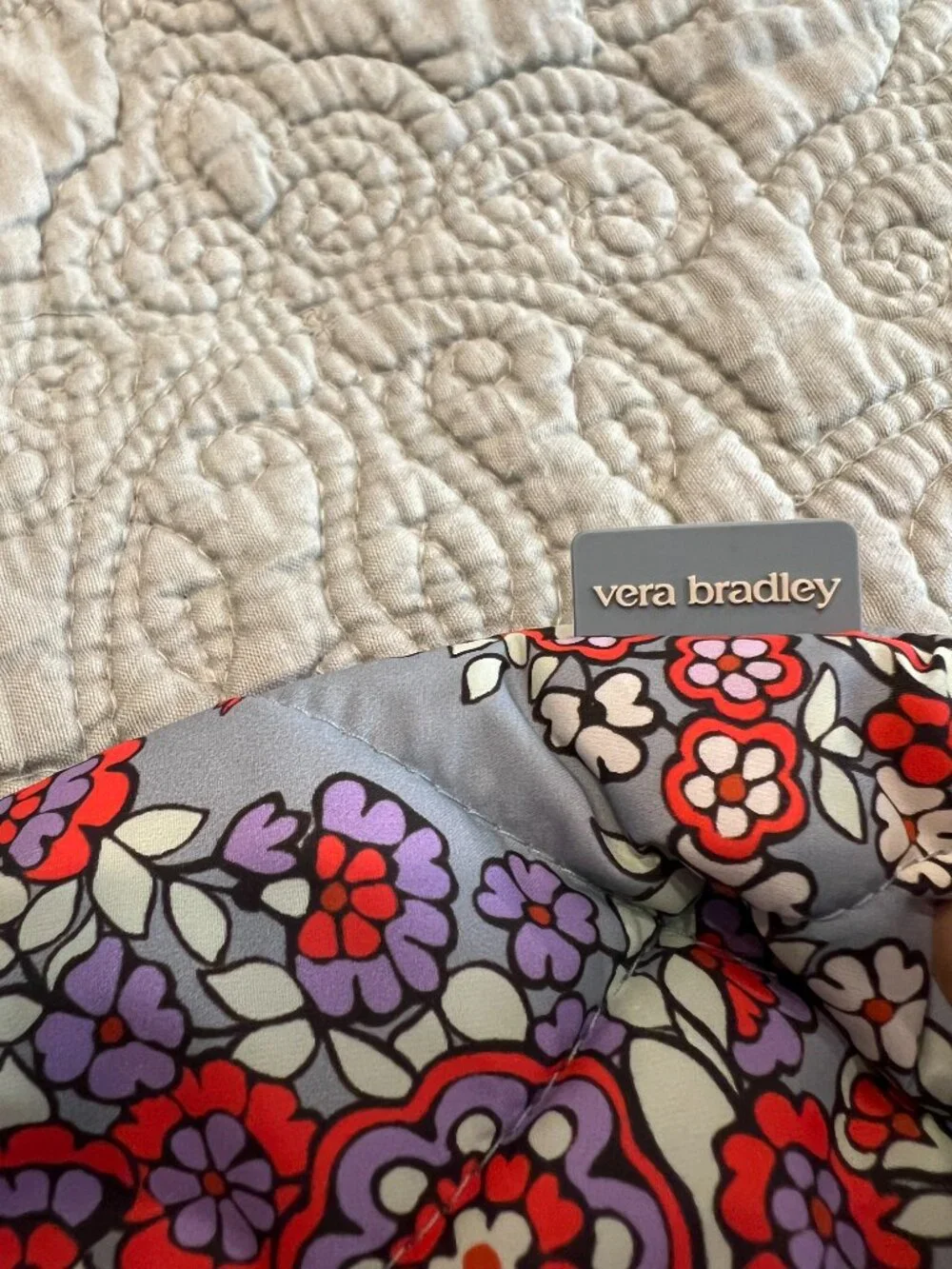 Vera Bradley measures 13