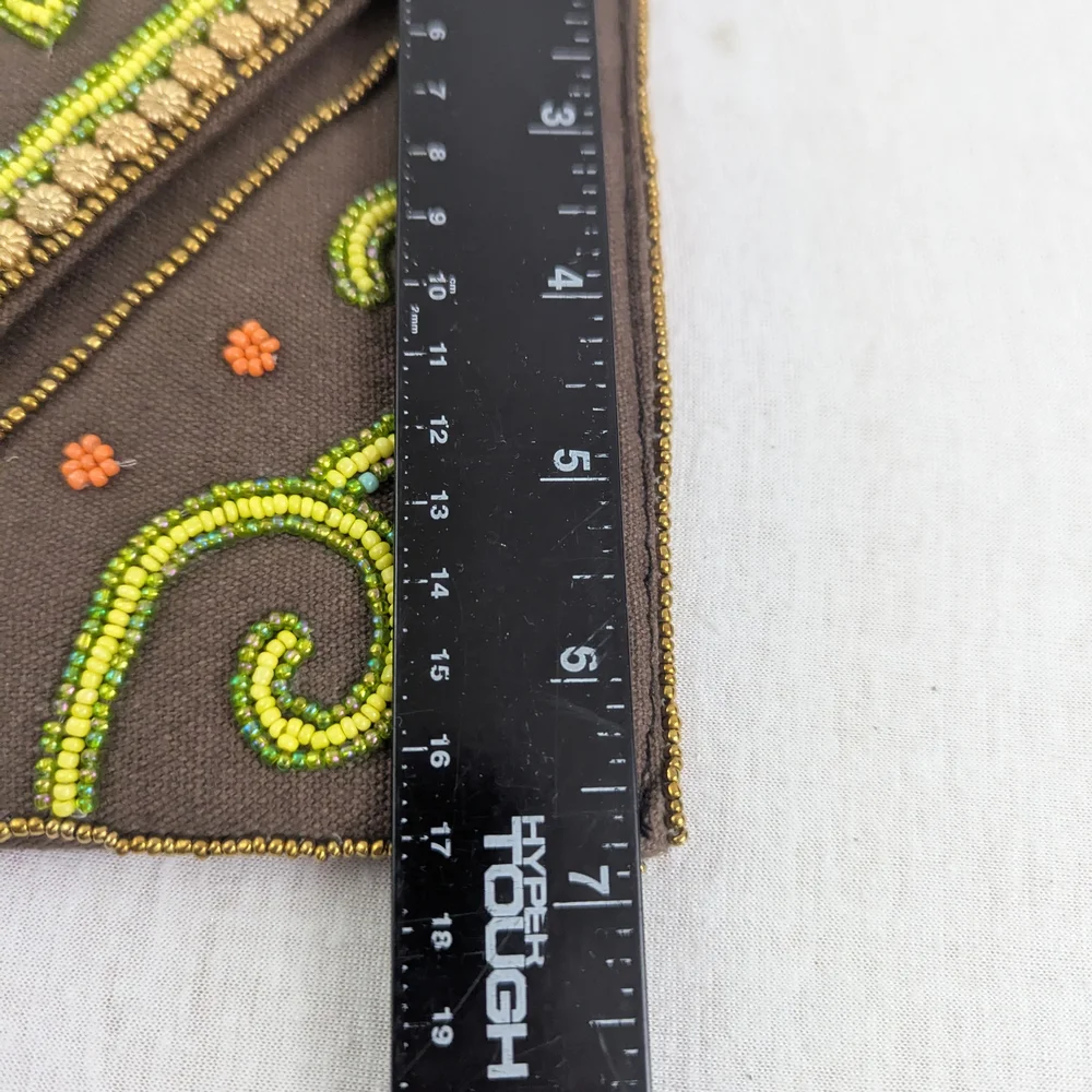 Coomi vibrant clutch