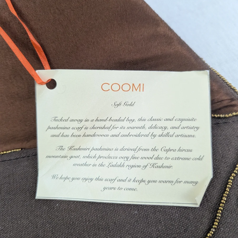 Coomi vibrant clutch